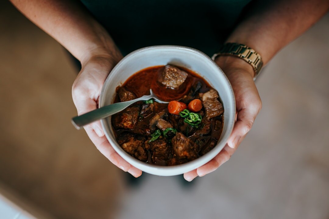 Bowl of Czech beef goulash with bread dumpling
