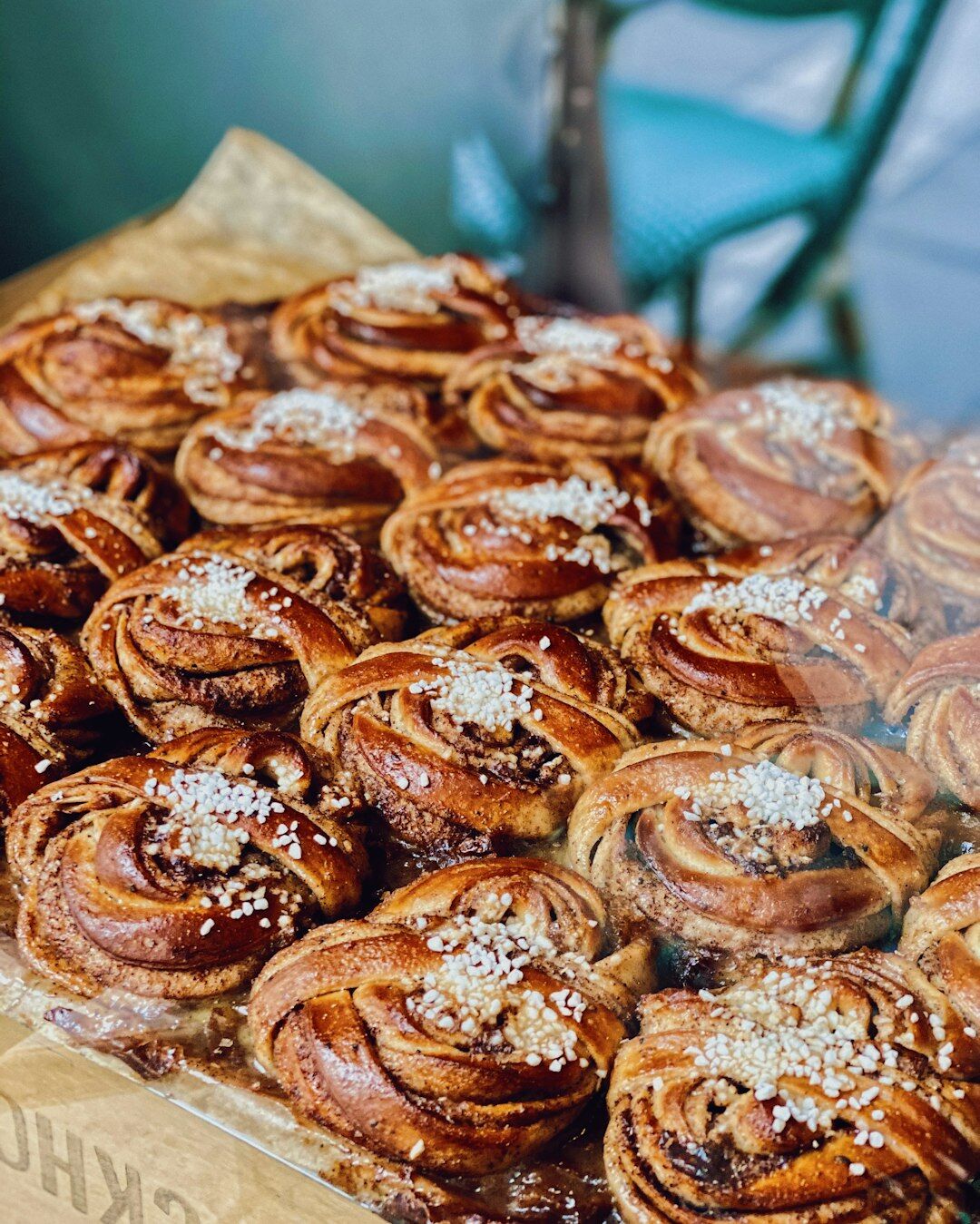 Freshly baked fluffy Czech buchty sweet buns on a baking tray
